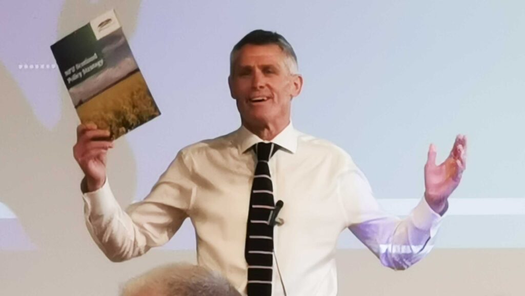 NFU Scotland's Jonnie Hall holding policy document