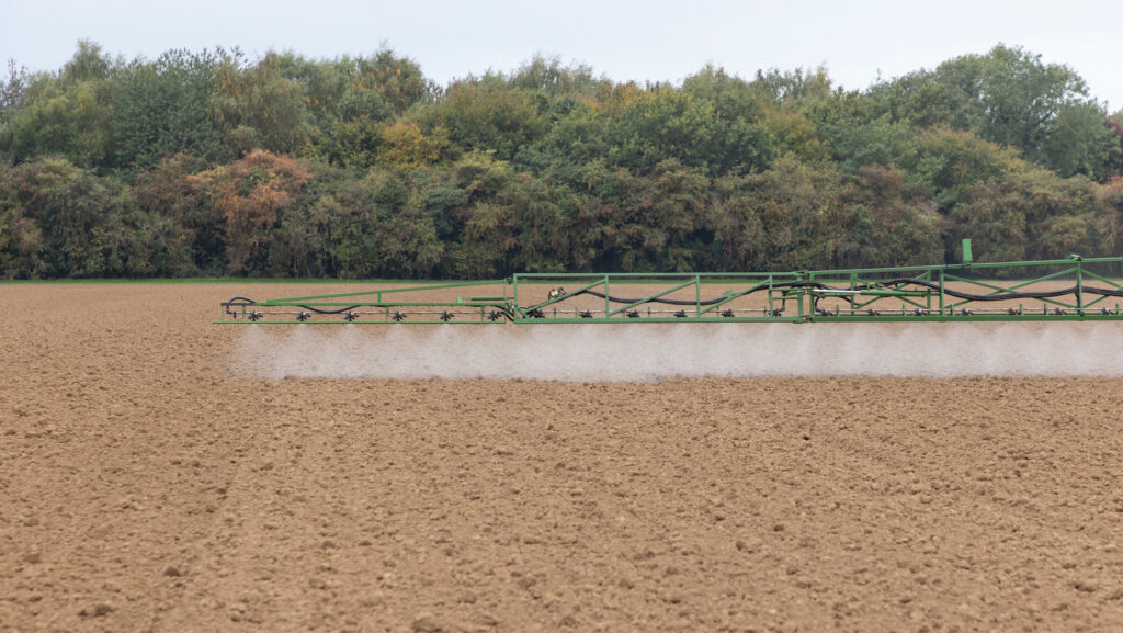 Applying pre-emergence herbicide