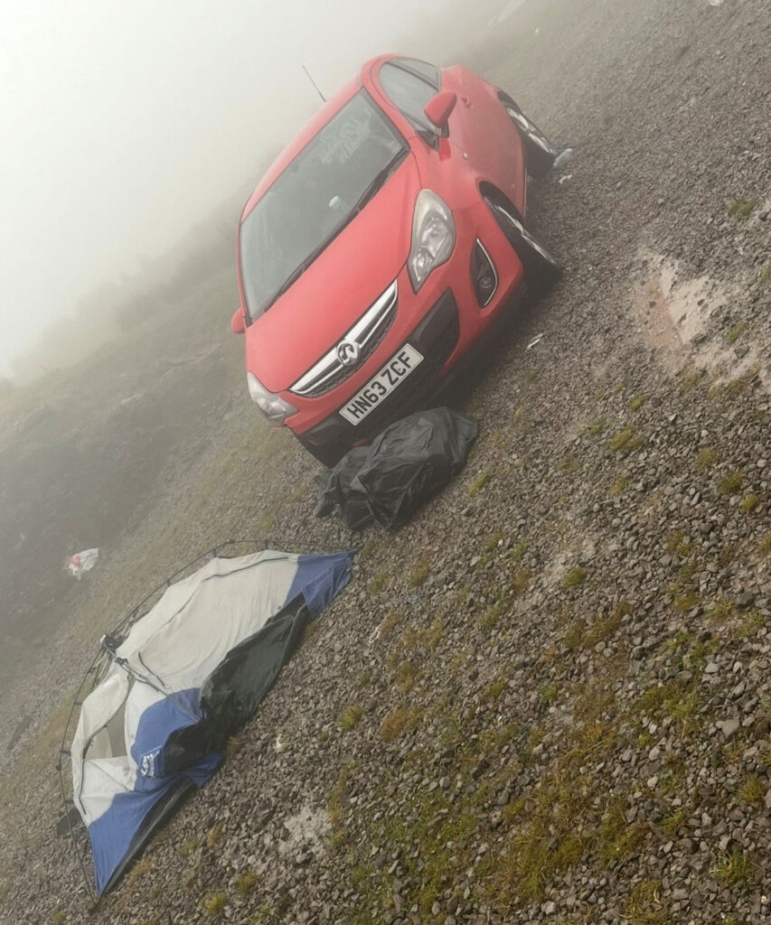 Car and tent left in field