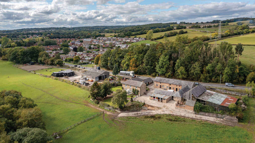 Aerial view of farmland and buildings