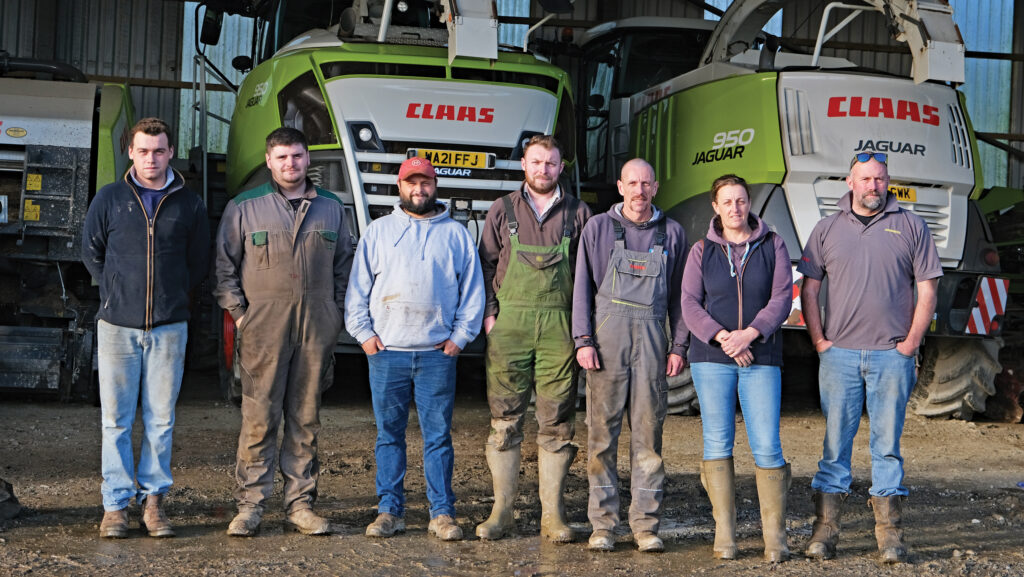 Group of people in a farmyard