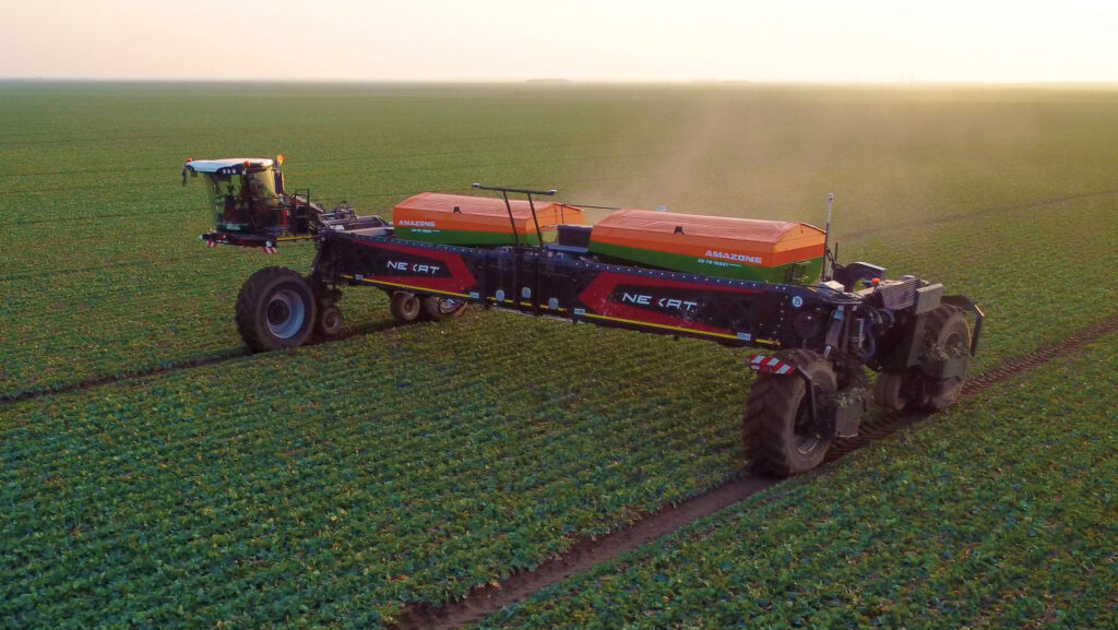 Nexat wide-span tractor with Amazone spreader
