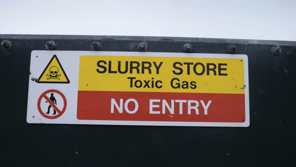 Warning sign on slurry store
