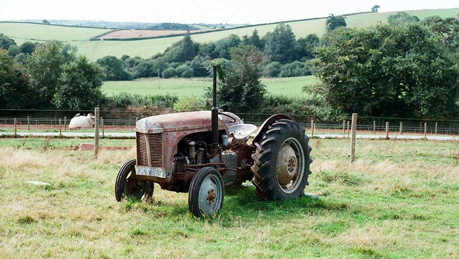 Old tractor in field