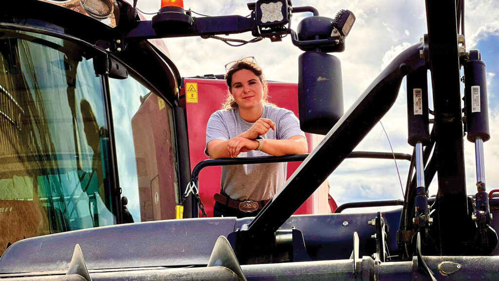 Eleanor Gilbert on a combine harvester
