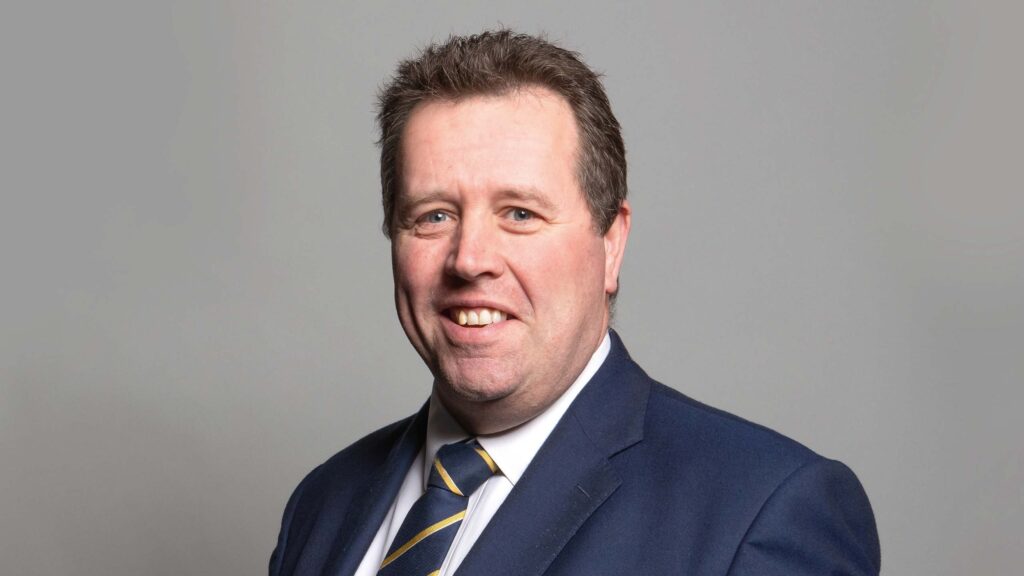 Portrait of Mark Spencer