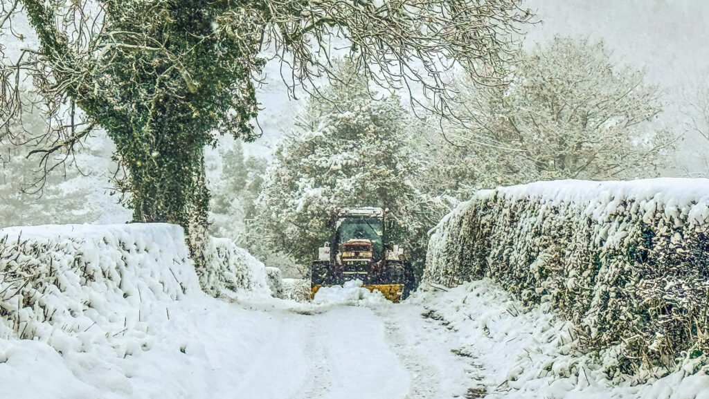 Tractor clearing snow