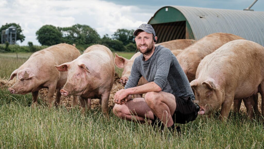 James Ross with his pigs