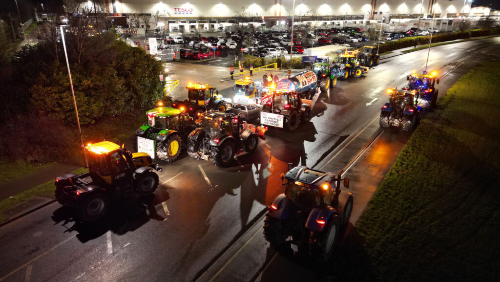 Farmers blockade Tesco supermarket depots in surprise raid