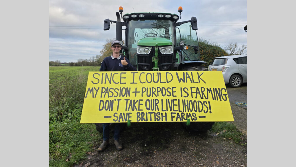 Suffolk farmer Spencer Campbell with protest sign