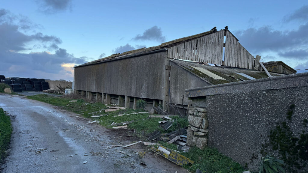 The damaged Dutch barn and debris at Brew Farm, Penzance © Emma Semmens