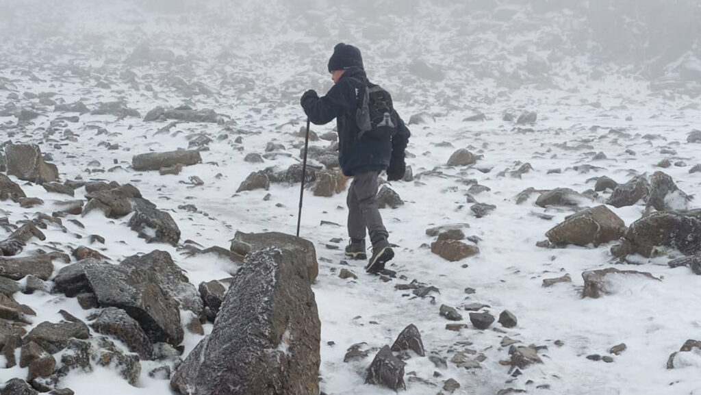 James Matthews climbing Ben Nevis