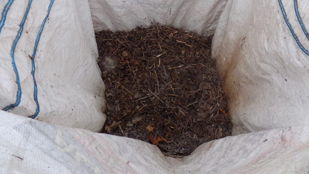 Materials collected in dumpy bag of Jim George's Hej Harvester
