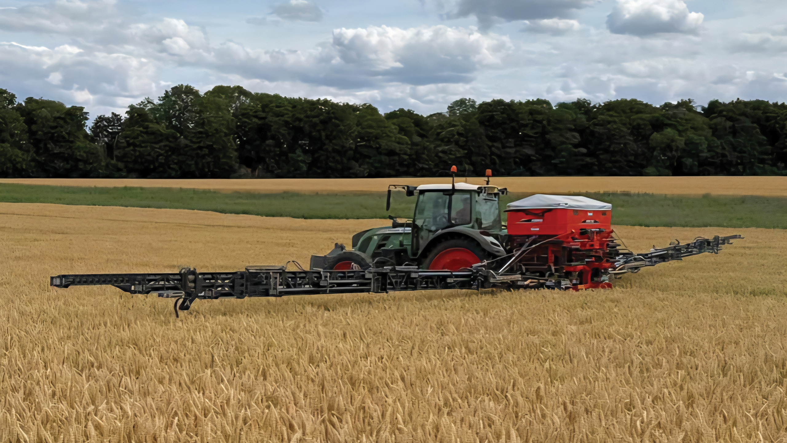 Versatile boom spreader does four jobs for Norfolk farm - Farmers Weekly