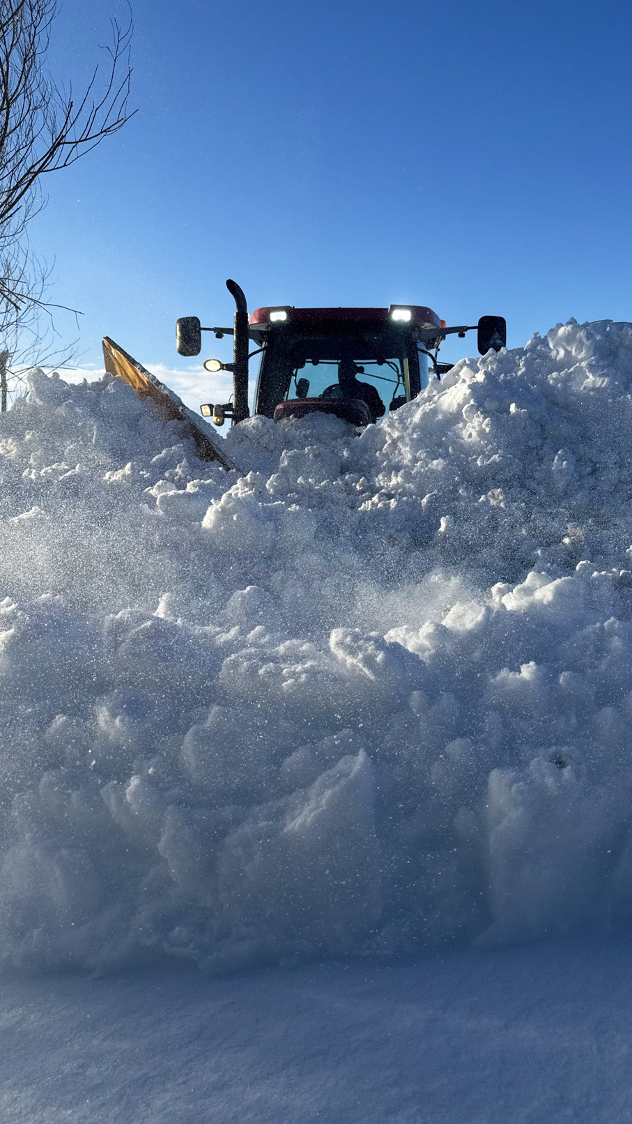 Stuart Gauld clearing deep snow with a plough