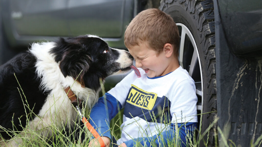 Tom Read at earlier age with a dog
