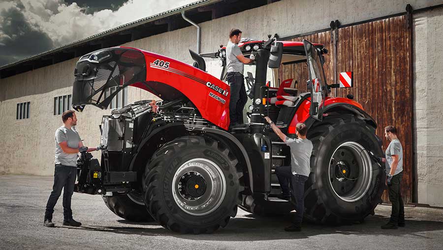 Mechanic working on tractor