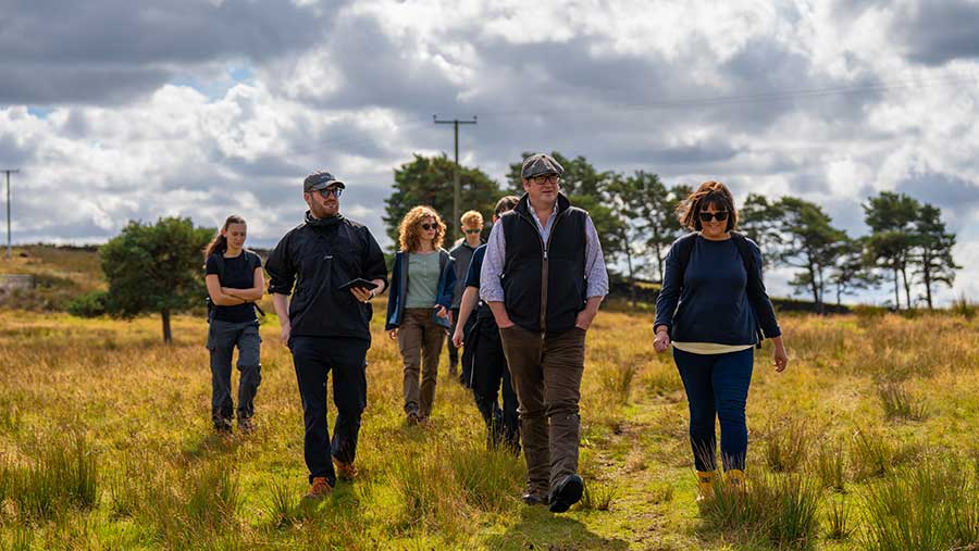 Will walking in front of group of people