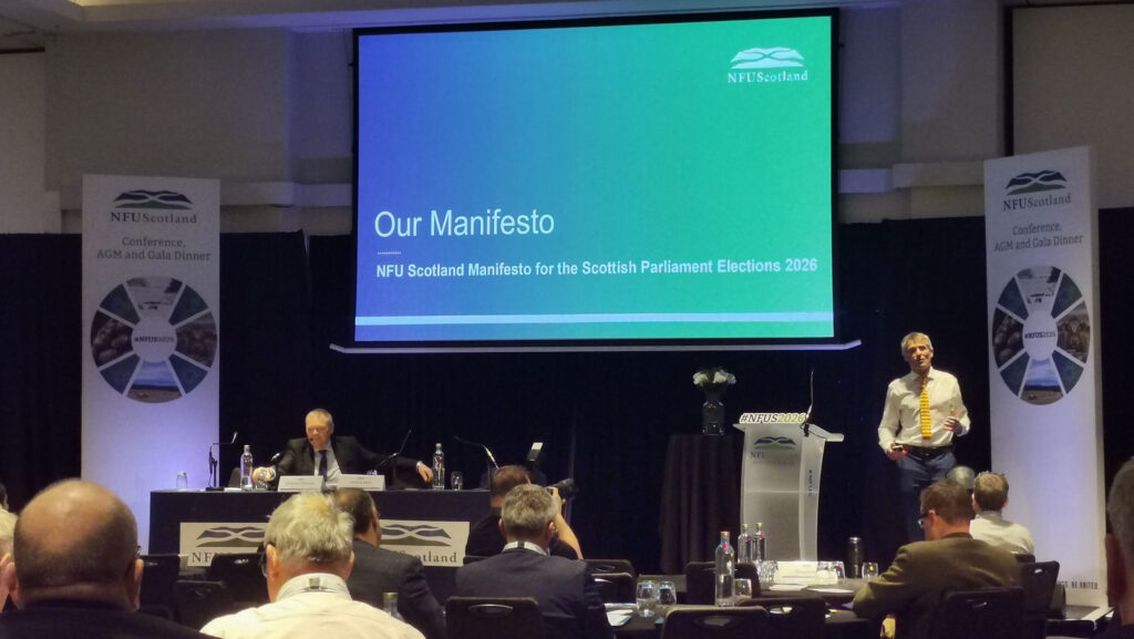 A man speaking at a podium