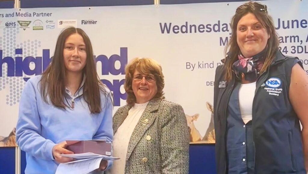 Kiera Smith (left) collecting shepherding award