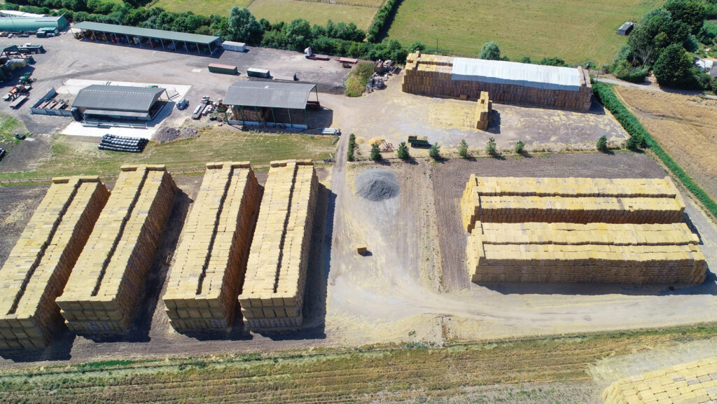 Aerial view of yard with straw bales