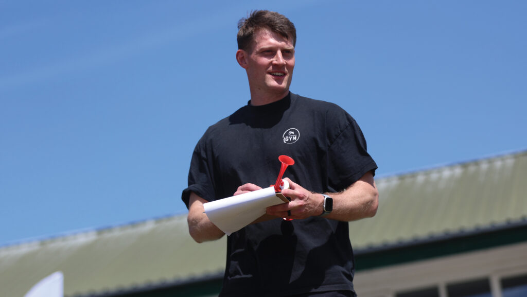 Man stands with a clipboard