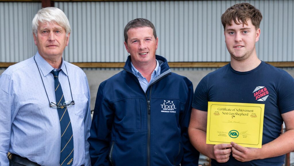 Jack Maxwell (right) collecting shepherding award