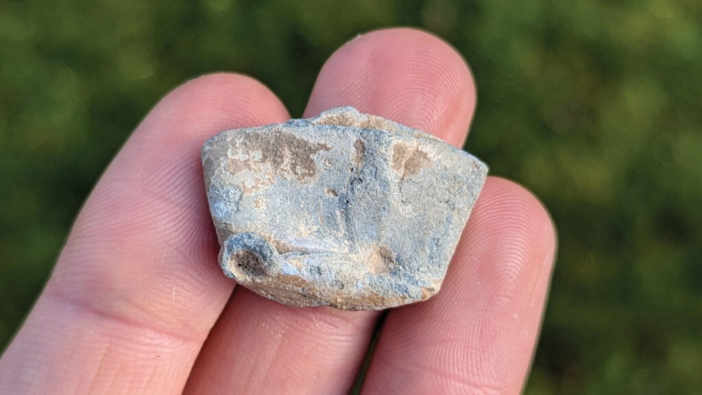 Flattened lead powder cap 