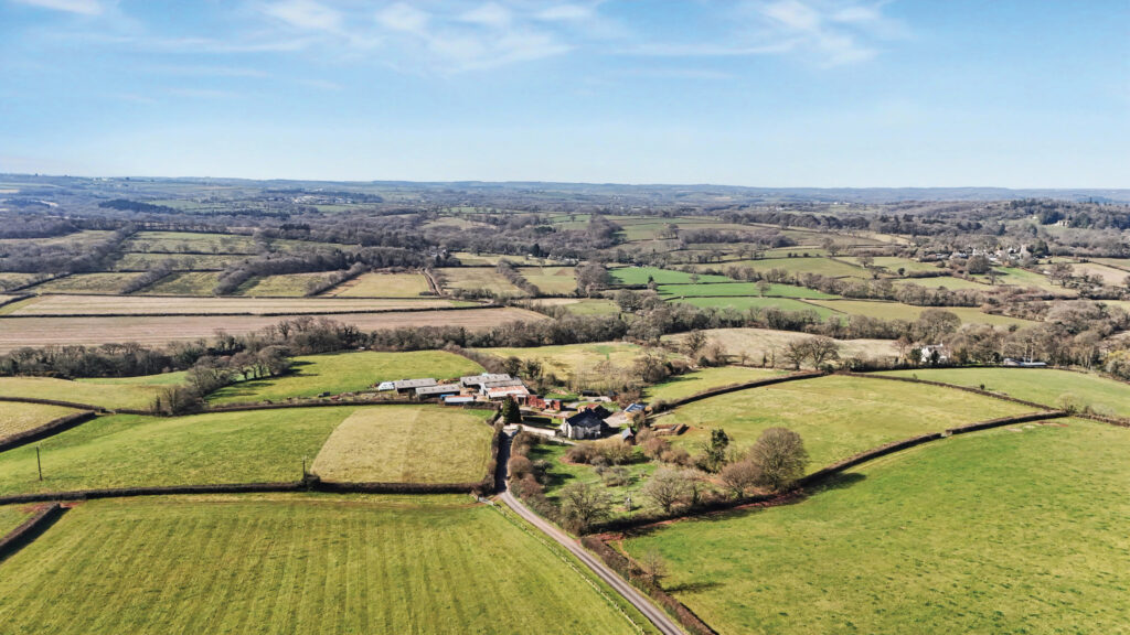 Aerial view of farmland and buildings