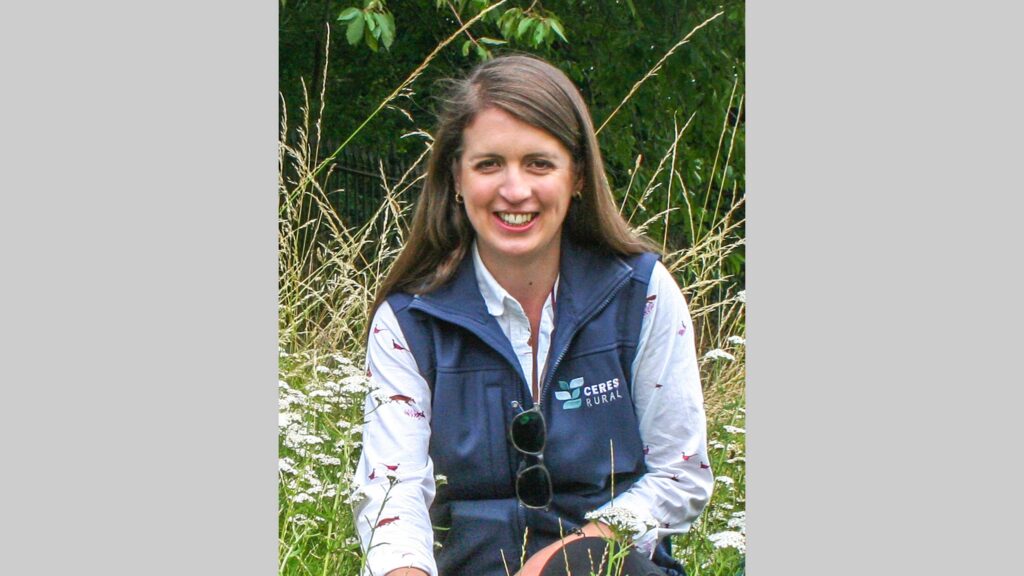 Woman poses in a field