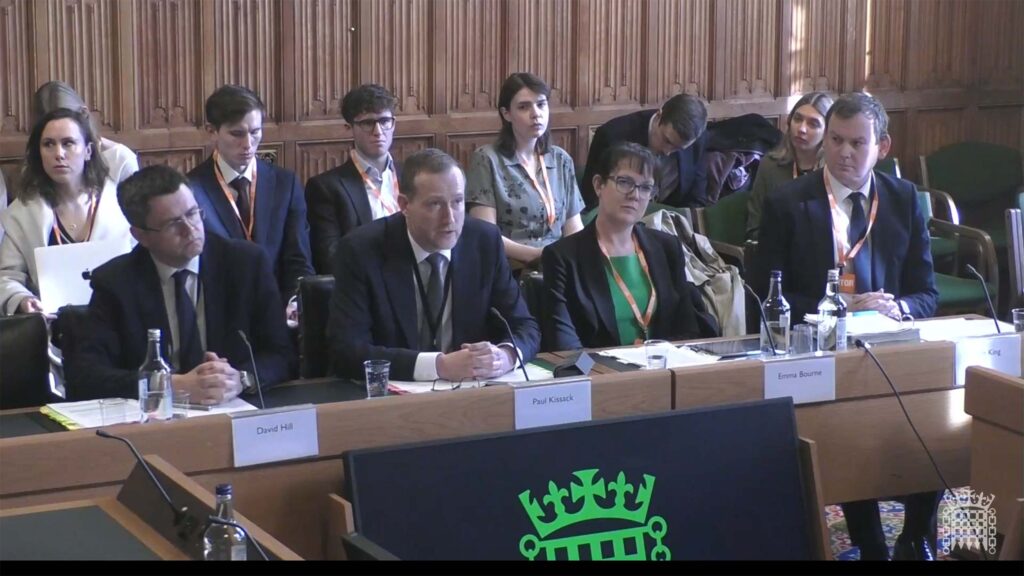 Paul Kissack (centre) at the hearing © Parliament TV