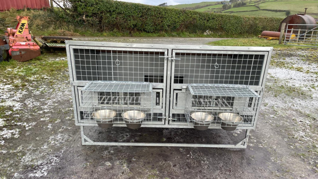 Farmer-made galvanised dog kennel gets slide-out floor