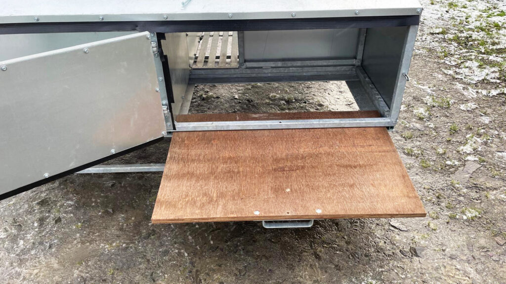 Plywood deck on dog kennel