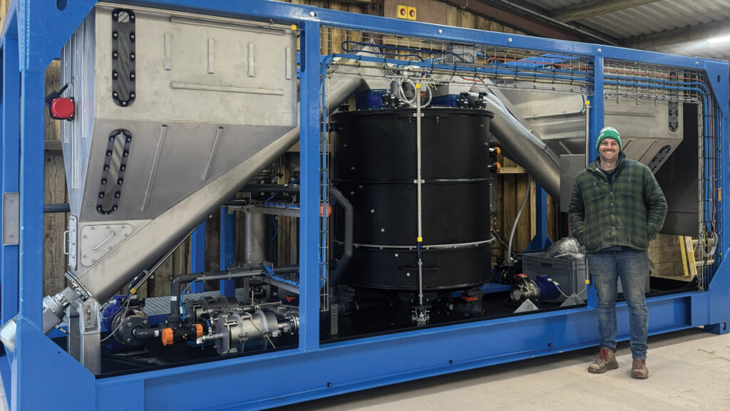 Andrew Sincock with the Triplex machine