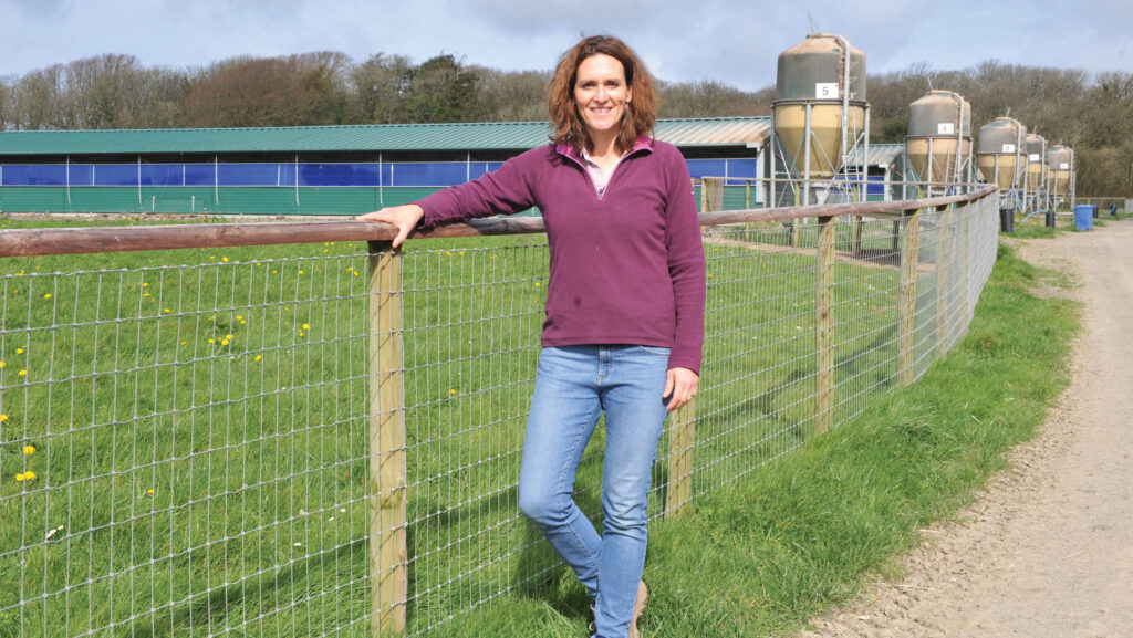 Louise Adams next to the range