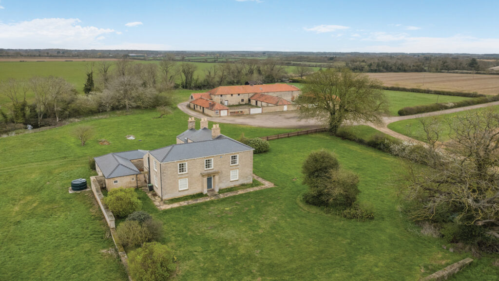Farmhouse with other farm buildings