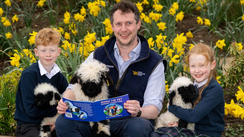 Rory and Zara Hughes with Royal Highland Show head of show David Tennant © Ian Georgeson