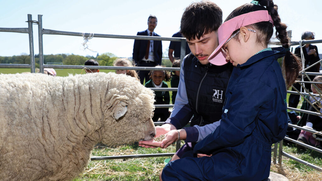 Children and sheep - Loan a Lamb scheme