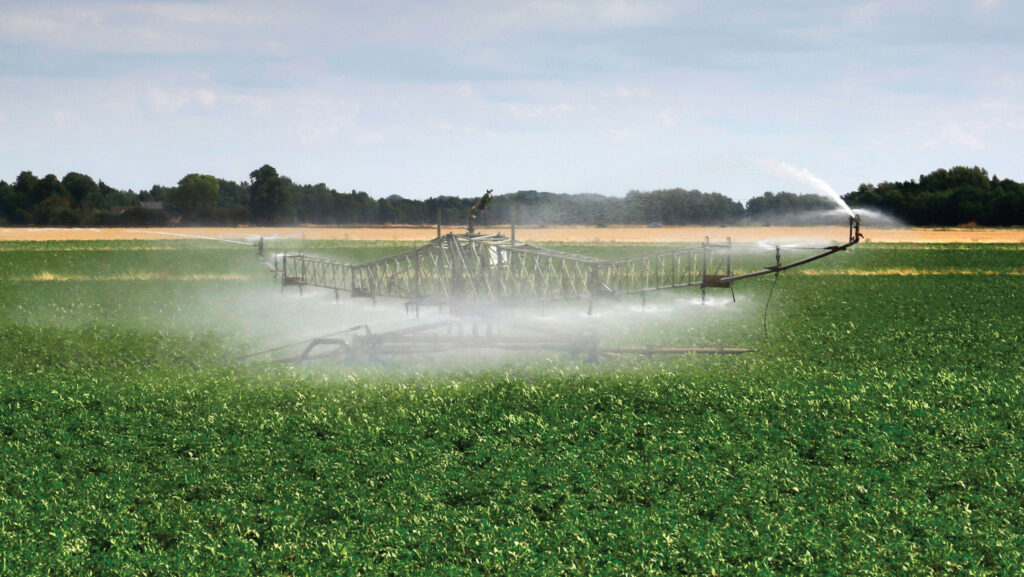 Irrigator spraying a crop