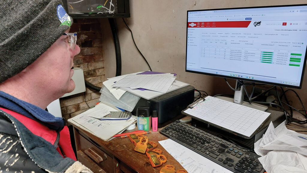 Farmer working at computer screen