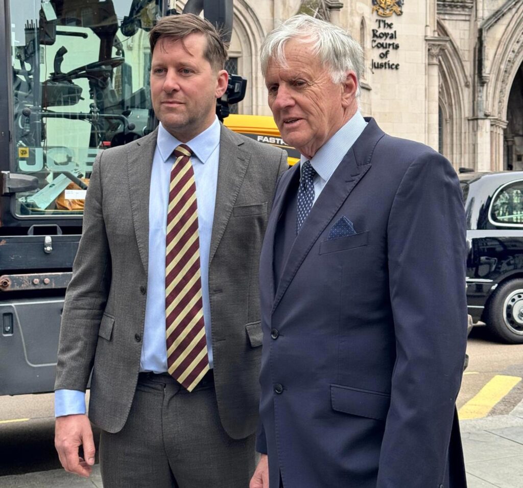 Farmer Tom Martin (left) with his father George outside the High Court