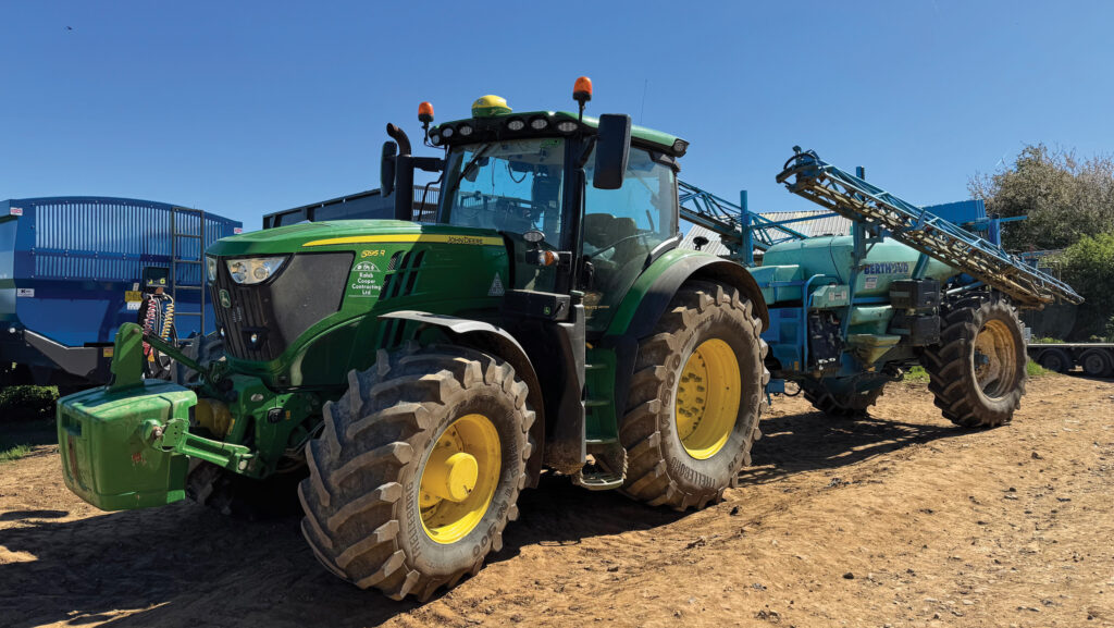 Tractor pulling a sprayer