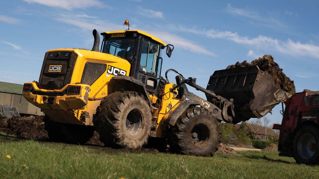 Loader at work shovelling muck
