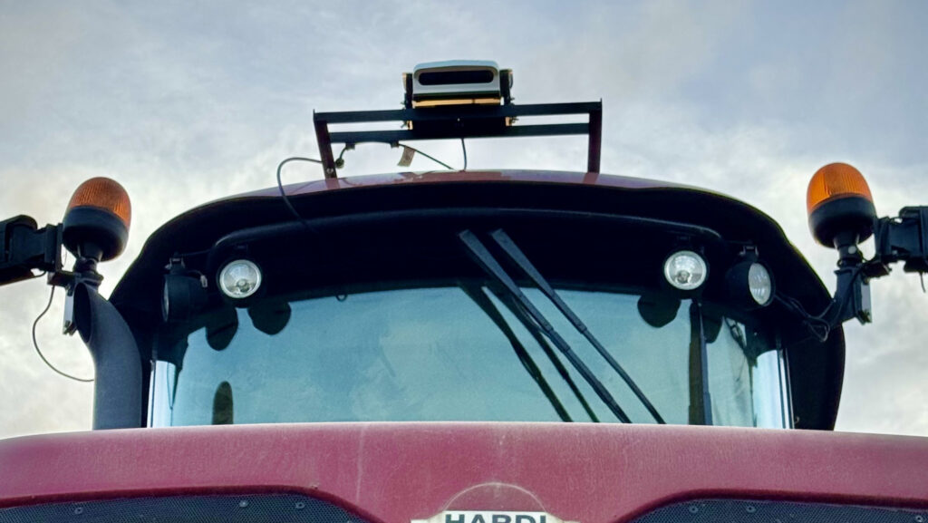 Close-up of the PerPlant hardware bolted to the roof of a sprayer