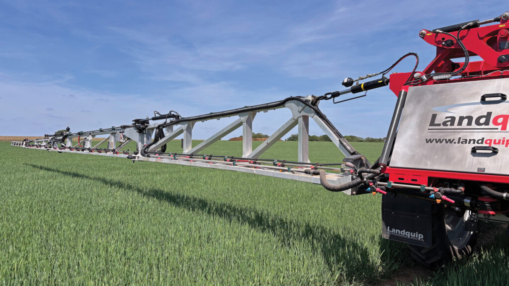 Boom extended from sprayer