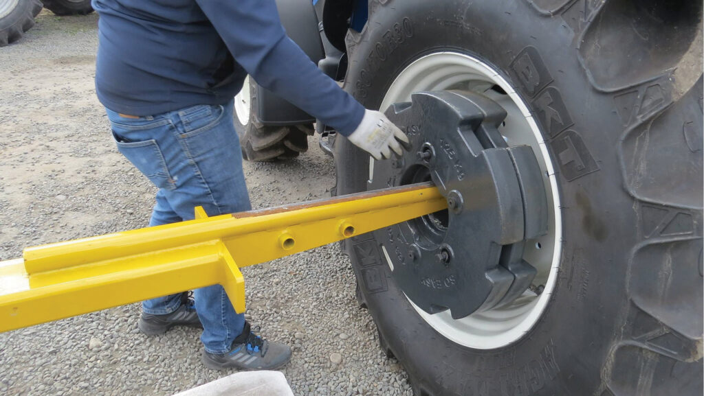 A 125kg 'So Easy' wafer is placed into position on the master weight © Quicke