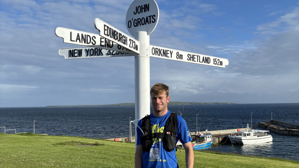 Will Sercombe at John O'Groats, the starting point of his run © Helen Sercombe