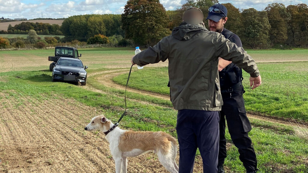 A hare coursing suspect is searched by police during an incident in Essex © Essex Police