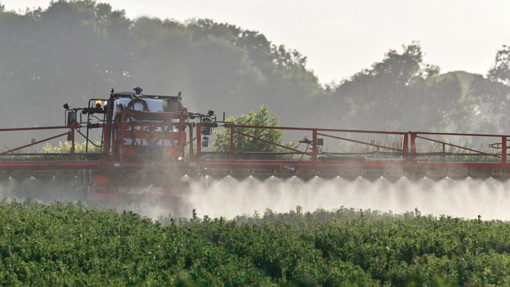 A sprayer working in a crop on a Scottish farm