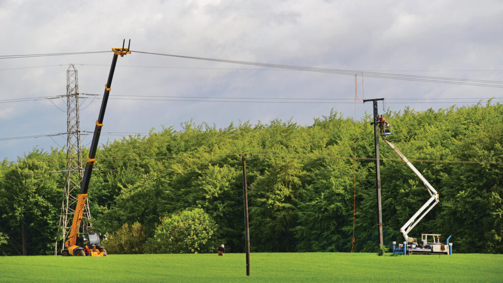 Engineers constructing new power line
